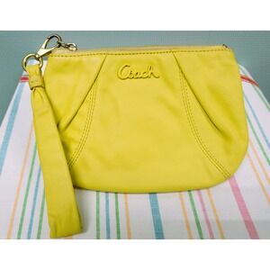 Coach Yellow Leather Wristlet. Preloved. With Tag
